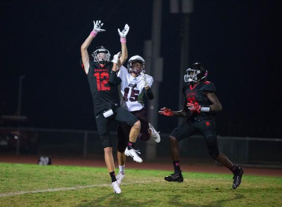 Examiner photo by Patricia Renick Iola Bulldog Senior #15 Chad Guidry successfully prevents an interception. Article Image Alt Text