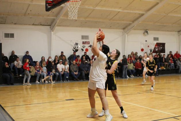 Examiner photo by Matthew Ybarra Richards sophomore post, Chesney Calhoun, gets inside position over a Lady Bulldog defender. Richards won the 29-1A matchup 46-42. Article Image Alt Text