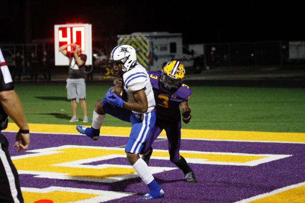 Hudson Minor connects with Xavier Steptoe in the corner of the endzone for a 21-yard score. Navasota defeated La Grange 33-21. Examiner photo by Matthew Ybarra Article Image Alt Text
