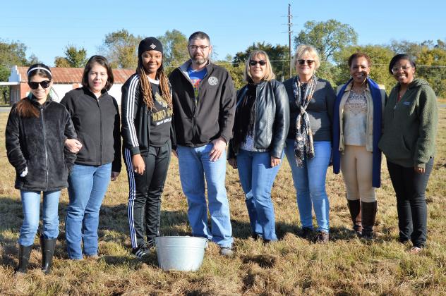 Examiner photo by Connie Clements Keep Navasota Beautiful members, joined by a few city employees, braved cool temperatures and dewy ground for the annual Wildflower Seed Scattering. Article Image Alt Text