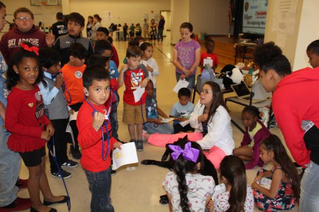Examiner photos by Matthew Ybarra Navasota’s John C Webb Elementary School hosted a kindergarten career day where students were exposed to a variety of potential careers including police office Article Image Alt Text