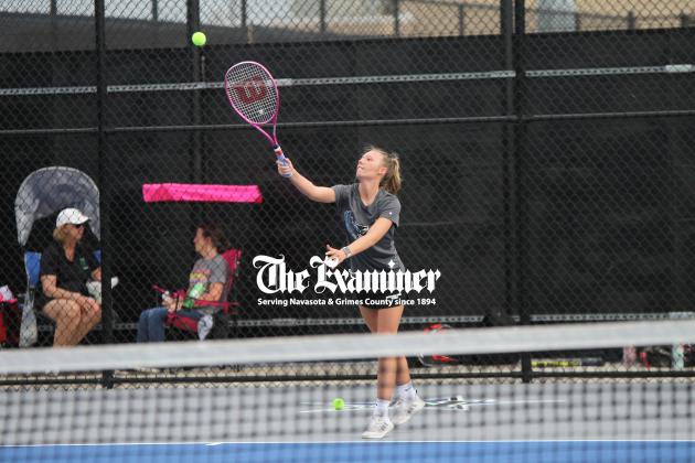 Belinowski Examiner photo by Matthew Ybarra Anderson-Shiro’s Shelbi Belinowski serves during double’s action at the Navasota Invitational March 22. Article Image Alt Text